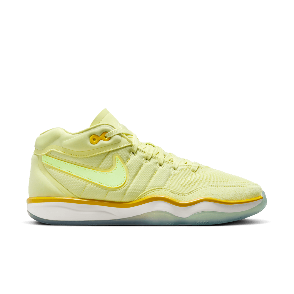 yellow and white basketball shoes
